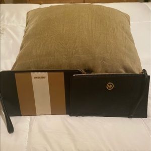 2 Michael Kors wristlets